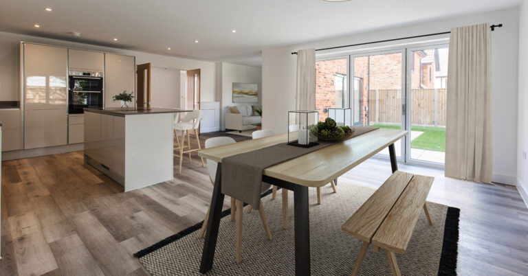 Open plan kitchen, dining and family area with bi-folding doors leading to garden.