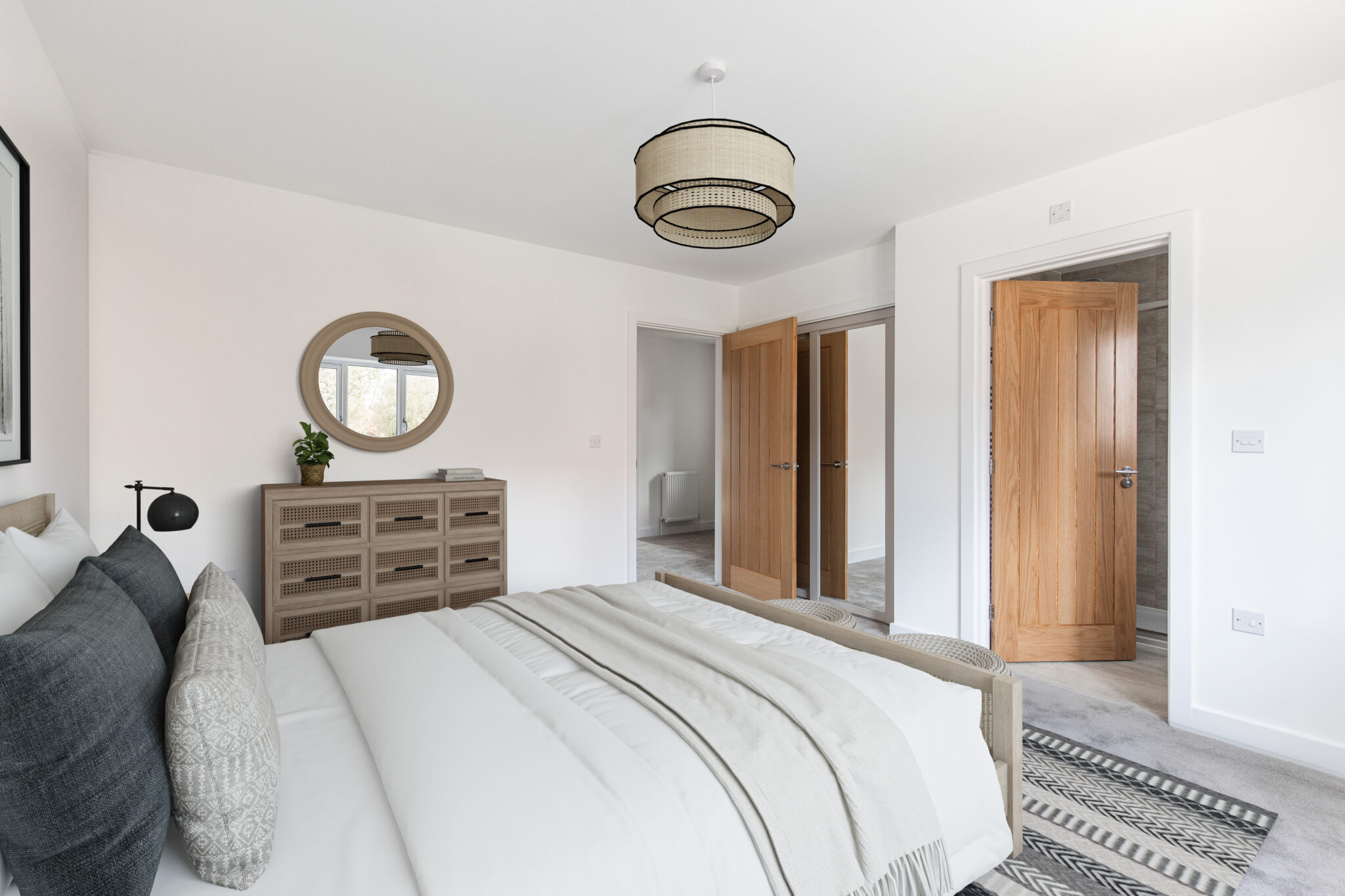 Master bedroom with built in wardrobes and door leading to ensuite.