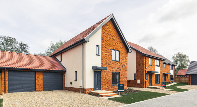 External view of 3 bedroom detached property with garage and driveway.